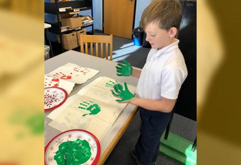 OLC 2nd graders lend a handprint for special quilt