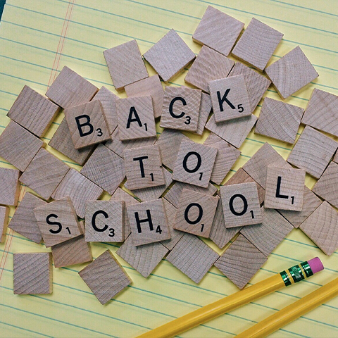 Letter tiles spell "Back to School".